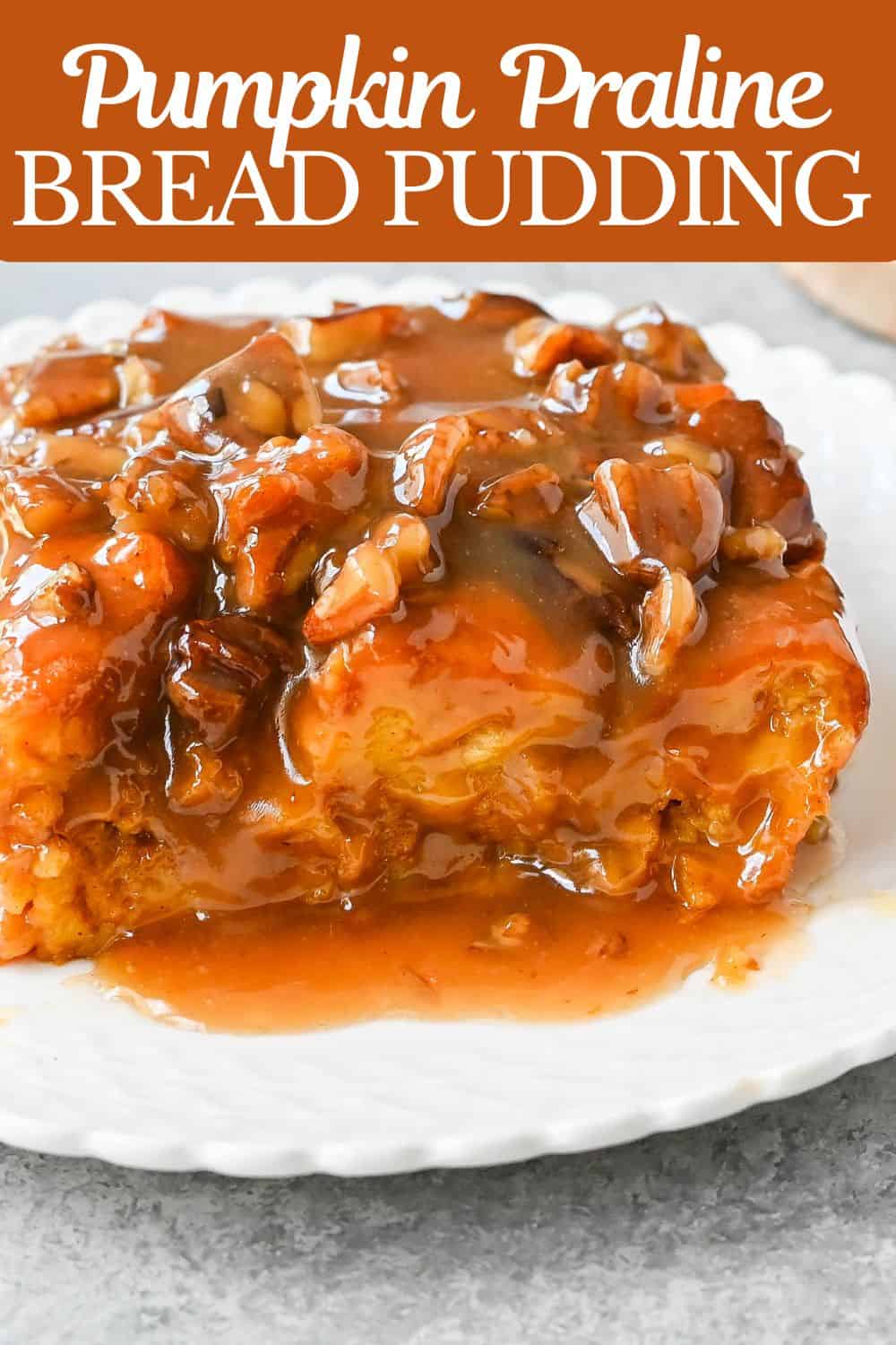 This Pumpkin Praline Bread Pudding is made with brioche bread, homemade pumpkin spice custard and baked until perfectly golden and then topped with a caramel butter pecan sauce. This Pumpkin Bread Pudding with Caramel Pecan Sauce is the perfect Fall comfort food dessert.