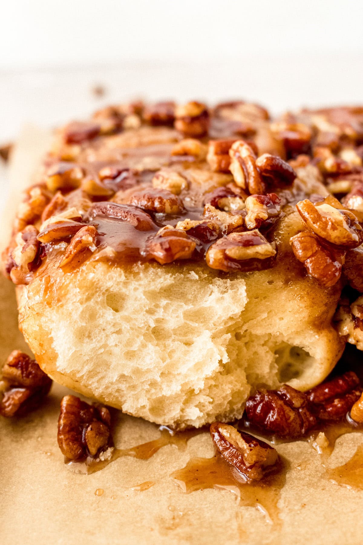 Caramel pecan sticky buns also known as caramel pecan rolls are homemade sweet rolls filled with a brown sugar cinnamon filling and topped with a rich caramel sauce and pecans. Sweet, nutty, and rich, this is the best sticky bun recipe!