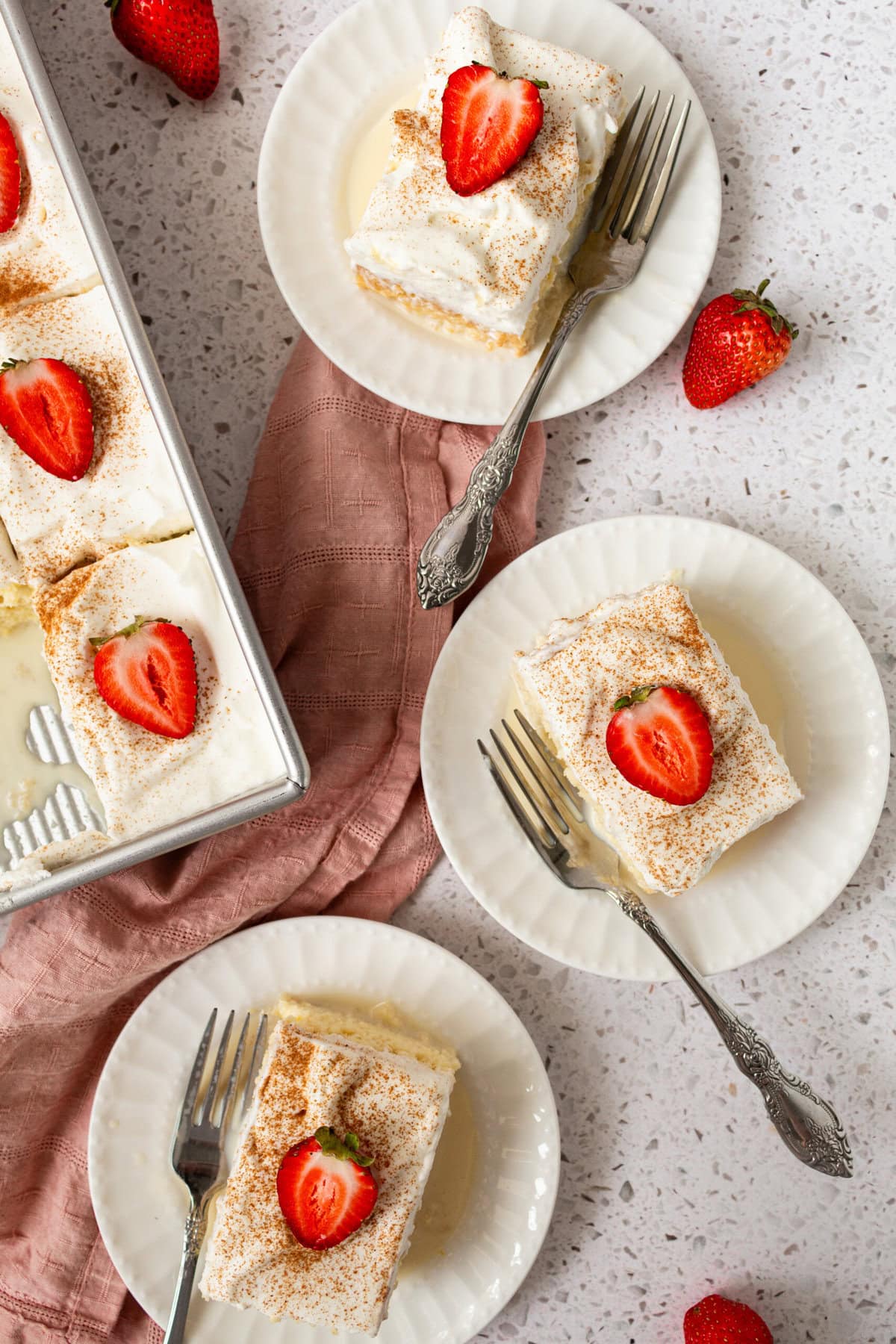 Tres Leches Cake. A classic Mexican dessert made with a vanilla sponge cake soaked with three kinds of milk -- heavy cream, evaporated milk and sweetened condensed milk and topped with fresh sweetened whipped cream. An authentic Mexican dessert recipe!