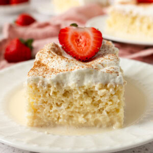 Tres Leches Cake. A classic Mexican dessert made with a vanilla sponge cake soaked with three kinds of milk -- heavy cream, evaporated milk and sweetened condensed milk and topped with fresh sweetened whipped cream. An authentic Mexican dessert recipe!