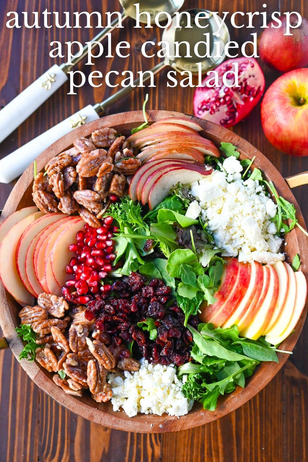 If you're looking for a beautiful, seasonal salad perfect for autumn, Fall, and Thanksgiving gatherings, this Honeycrisp Apple and Candied Pecan Salad is sure to impress! It has a combination of crisp fruits, creamy goat cheese, sweet and crunchy candied pecans, and a tangy homemade maple dressing.