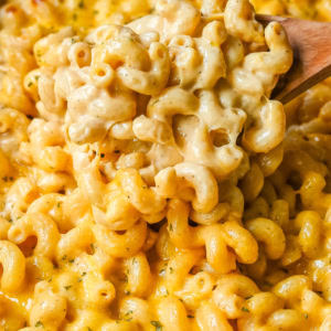 How to make a quick, easy, creamy, cheesy homemade mac and cheese recipe. All of the tips and tricks for making a velvety cheese sauce that is completely smooth. You will love this easy mac and cheese recipe!