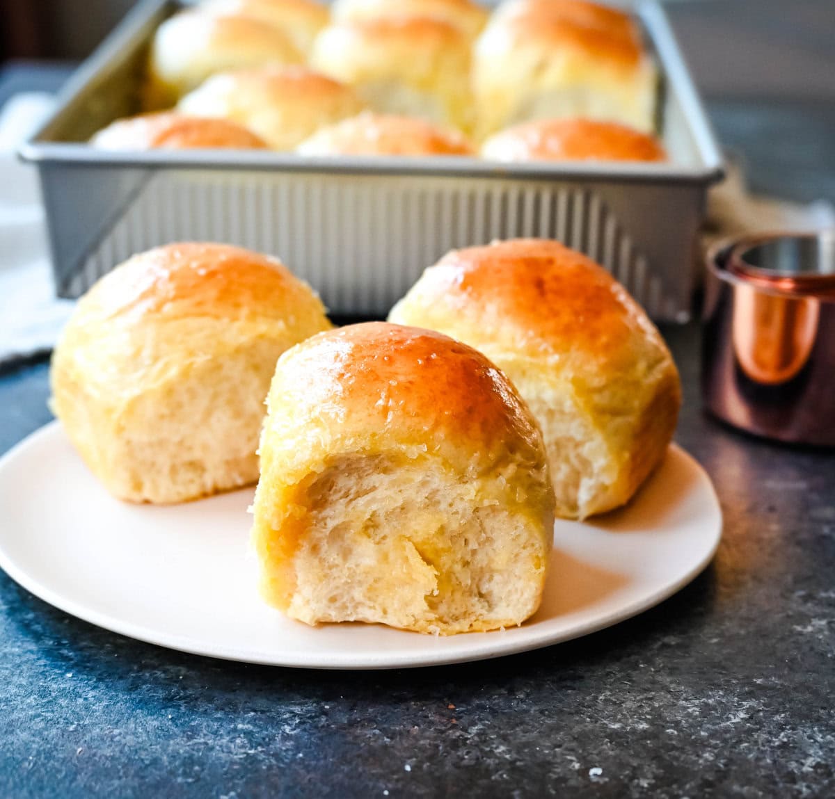 These Japanese milk bread dinner rolls are the most soft, fluffy, and tender homemade rolls due to a special technique. This game changing technique makes all of the difference for making melt-in-your-mouth rolls.