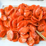 These Roasted Carrots with a Maple Brown Sugar Glaze are carrots roasted in butter, real maple syrup, brown sugar, and a touch of red pepper flakes. These maple glazed carrots are sweet and savory and a perfect side dish recipe.