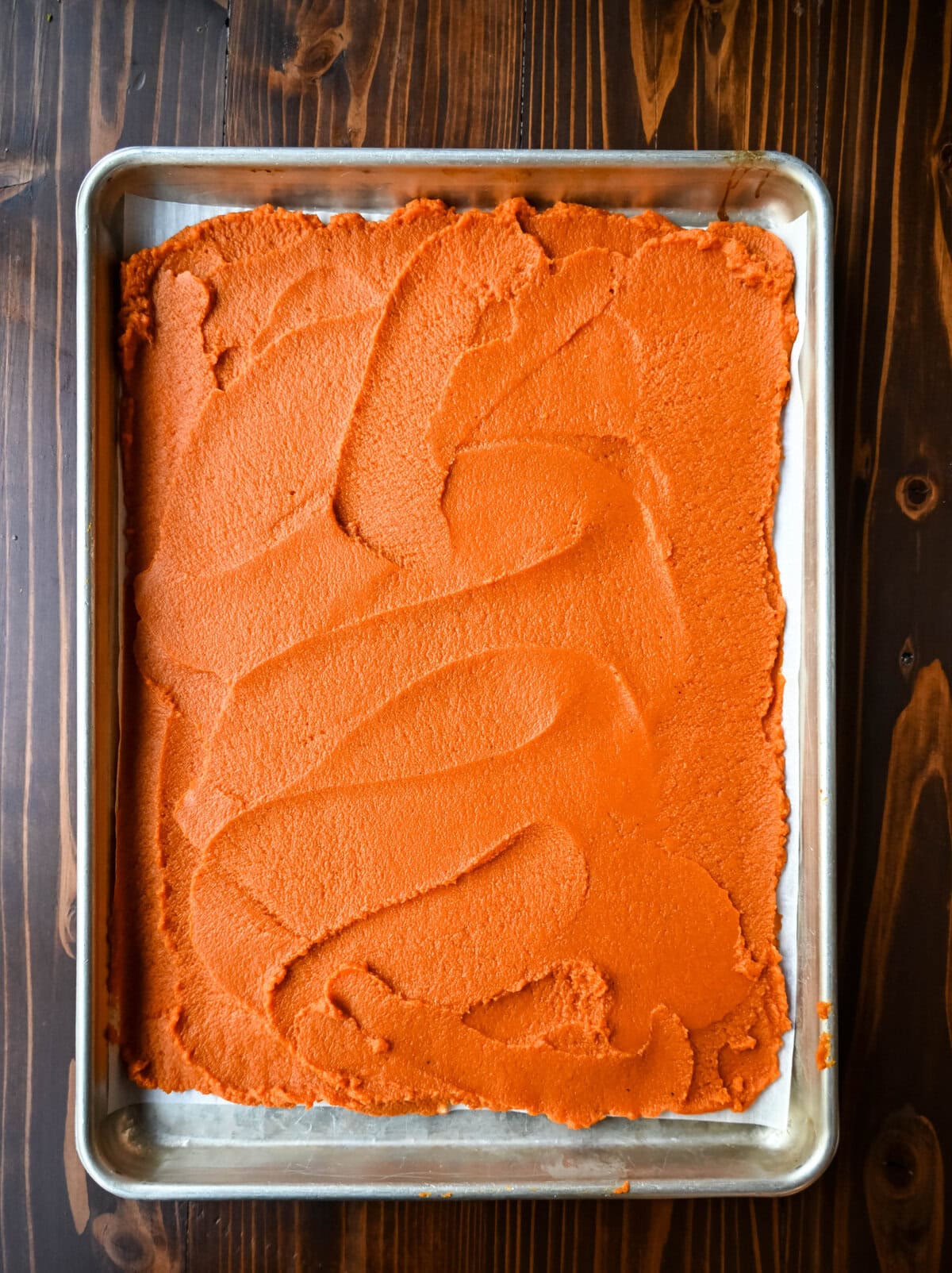 Roasting pumpkin pie puree to remove moisture to make the milk bar pumpkin pie.