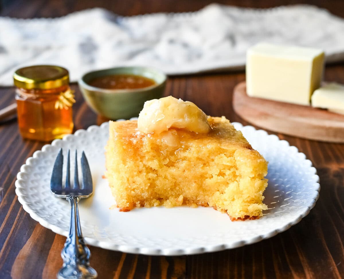 A slice of cornbread with honey butter on top. The Best Moist Cornbread Recipe. This is the best cornbread recipe that is moist, tender, and flavorful. This homemade cornbread recipe is both sweet and savory and perfect for pairing with honey butter. This easy cornbread recipe is going to be such a hit and is always a crowd pleaser.