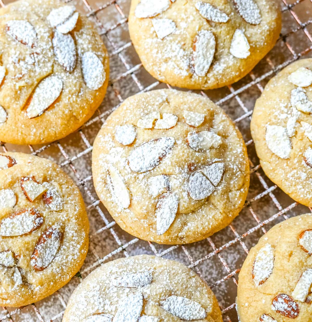 Almond Croissant Cookies taste like an almond croissant—buttery, flaky, and packed with a homemade almond filling. Almond croissant cookies are a delectable mashup of the classic French pastry and a soft, crumbly cookie, and they’ve gone viral on TikTok for good reason! 