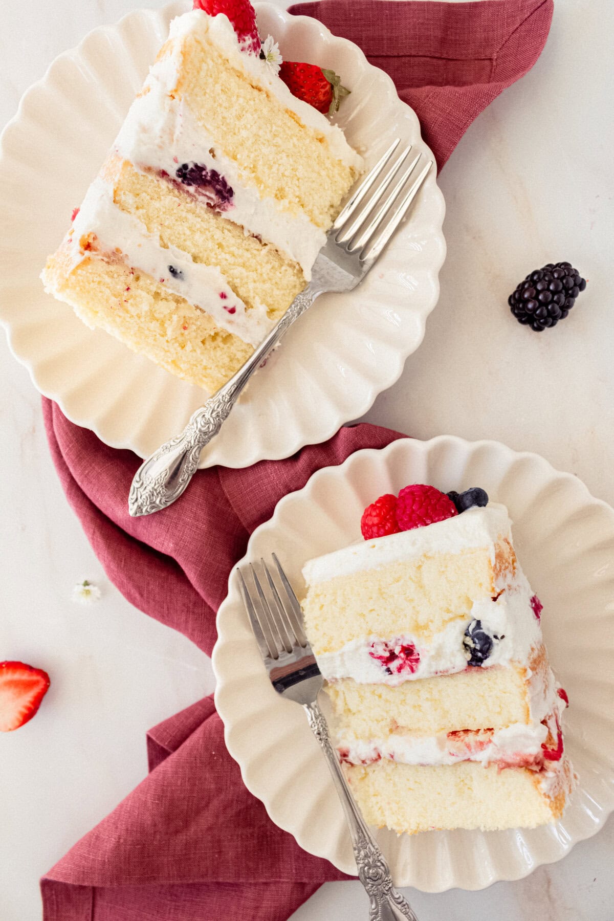 Chantilly Cake Recipe. Homemade moist yellow cake layered with fluffy sweet cream cheese whipped cream frosting and fresh berries. This Chantilly Cake is famous at Whole Foods and here's my copycat version so you can make it at home. This is the best Chantilly Cake recipe!