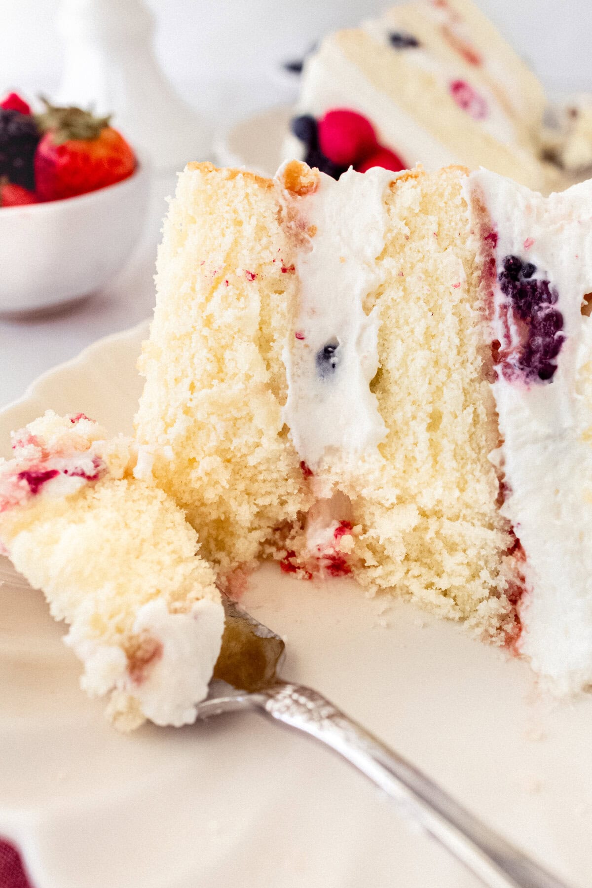 Chantilly Cake Recipe. Homemade moist yellow cake layered with fluffy sweet cream cheese whipped cream frosting and fresh berries. This Chantilly Cake is famous at Whole Foods and here's my copycat version so you can make it at home. This is the best Chantilly Cake recipe!