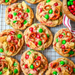 Get ready to bake the ultimate Christmas treat with these Christmas Kitchen Sink Cookies! Packed with holiday M&M's, pretzels, potato chips, sprinkles, and optional chocolate chips, these cookies bring together sweet, salty, and festive flavors in every bite. They're easy to make, fun to customize, and perfect for gifting, cookie swaps, and for your Christmas baking.