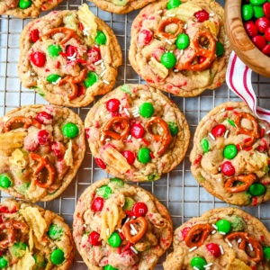 Get ready to bake the ultimate Christmas treat with these Christmas Kitchen Sink Cookies! Packed with holiday M&M's, pretzels, potato chips, sprinkles, and optional chocolate chips, these cookies bring together sweet, salty, and festive flavors in every bite. They're easy to make, fun to customize, and perfect for gifting, cookie swaps, and for your Christmas baking.