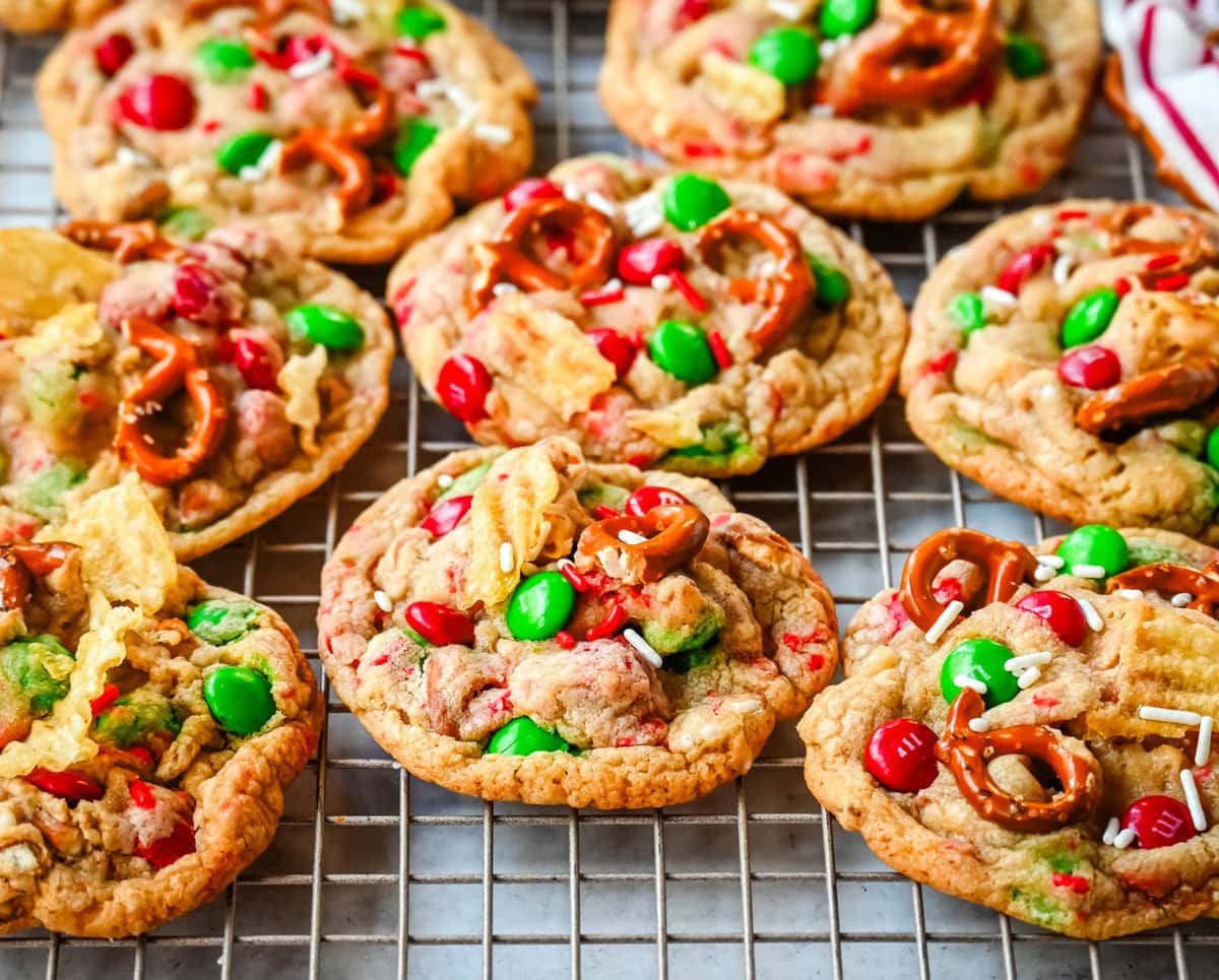 Get ready to bake the ultimate Christmas treat with these Christmas Kitchen Sink Cookies! Packed with holiday M&M's, pretzels, potato chips, sprinkles, and optional chocolate chips, these cookies bring together sweet, salty, and festive flavors in every bite. They're easy to make, fun to customize, and perfect for gifting, cookie swaps, and for your Christmas baking.