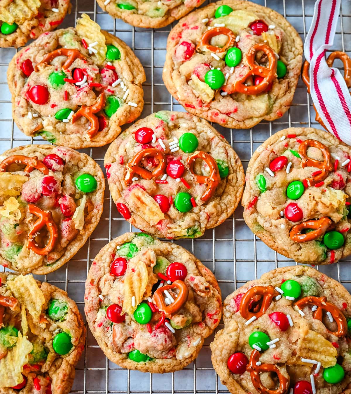 Get ready to bake the ultimate Christmas treat with these Christmas Kitchen Sink Cookies! Packed with holiday M&M's, pretzels, potato chips, sprinkles, and optional chocolate chips, these cookies bring together sweet, salty, and festive flavors in every bite. They're easy to make, fun to customize, and perfect for gifting, cookie swaps, and for your Christmas baking.