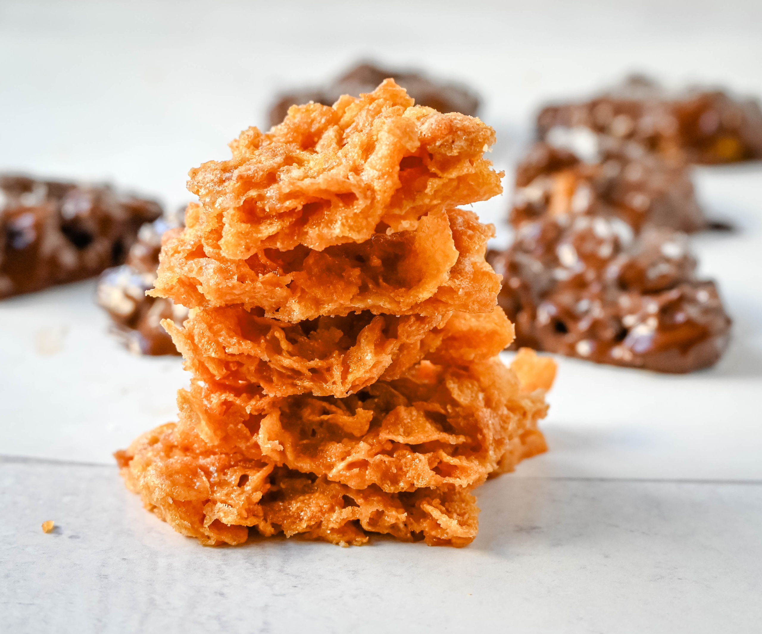 Cornflake Crack is a super easy treat made with only three ingredients -- cornflakes cereal, butter, and brown sugar—this quick treat bakes into a caramelized layer of goodness that’s perfect on its own or even better when dipped in melted chocolate. This can also be called Cornflake Crunch or Cornflake Candy.