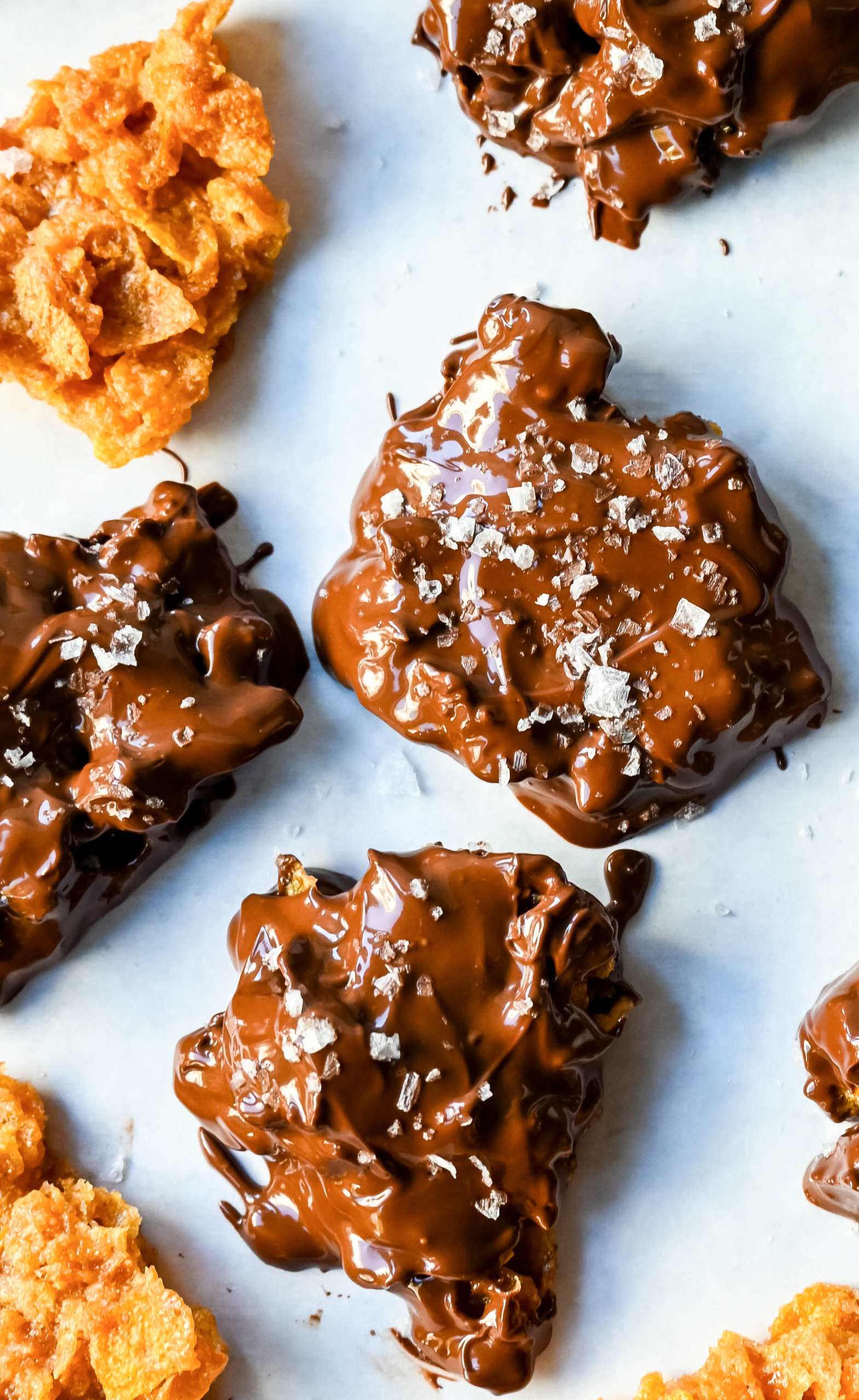 Cornflake Crack is a super easy treat made with only three ingredients -- cornflakes cereal, butter, and brown sugar—this quick treat bakes into a caramelized layer of goodness that’s perfect on its own or even better when dipped in melted chocolate. This can also be called Cornflake Crunch or Cornflake Candy.