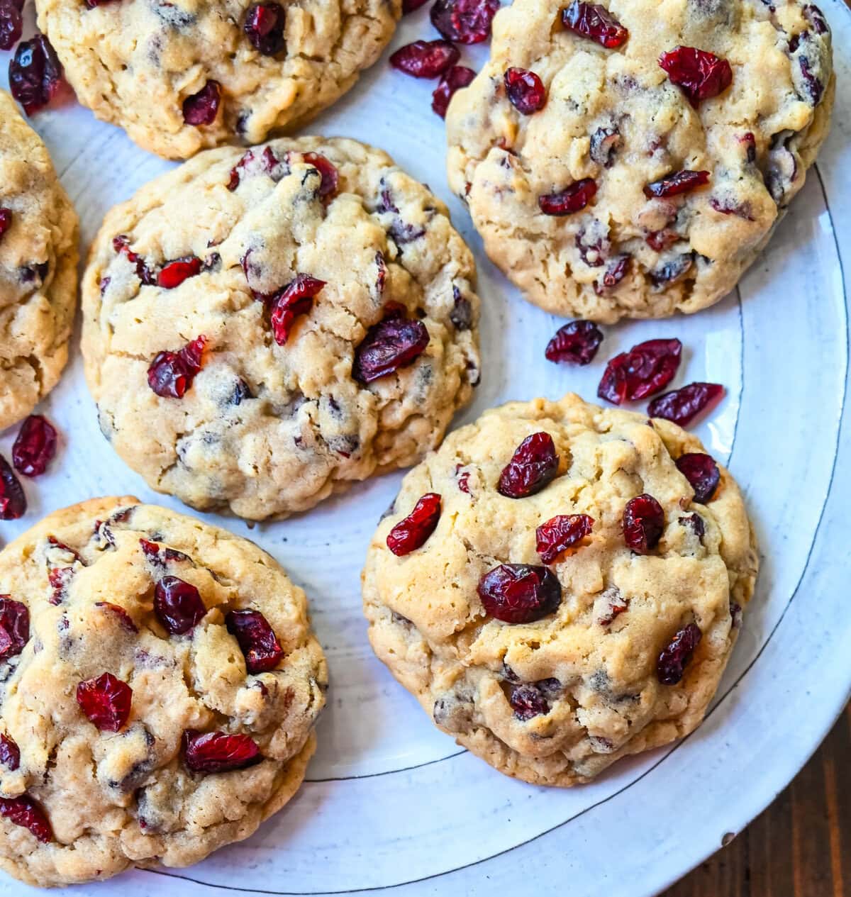 Soft chewy brown sugar oatmeal cookies with sweetened dried cranberries. A chewy and hearty oatmeal cookie that everyone will love! These Cranberry Oatmeal Cookies always receive 5-star reviews. You will love these Oatmeal Cranberry Cookies!