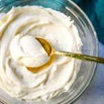 How to make the silkiest, creamiest cream cheese frosting with the perfect amount of sweetness and tang. Sharing the secrets and tips and tricks for making the best cream cheese frosting recipe, which is perfect for adding to so many desserts.