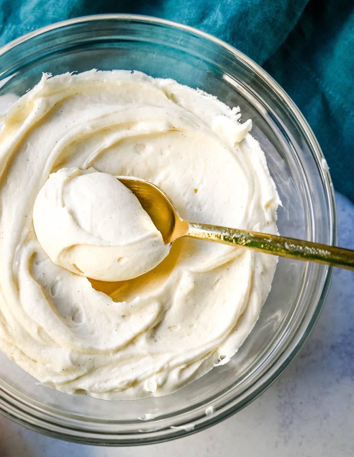 How to make the silkiest, creamiest cream cheese frosting with the perfect amount of sweetness and tang. Sharing the secrets and tips and tricks for making the best cream cheese frosting recipe, which is perfect for adding to so many desserts.