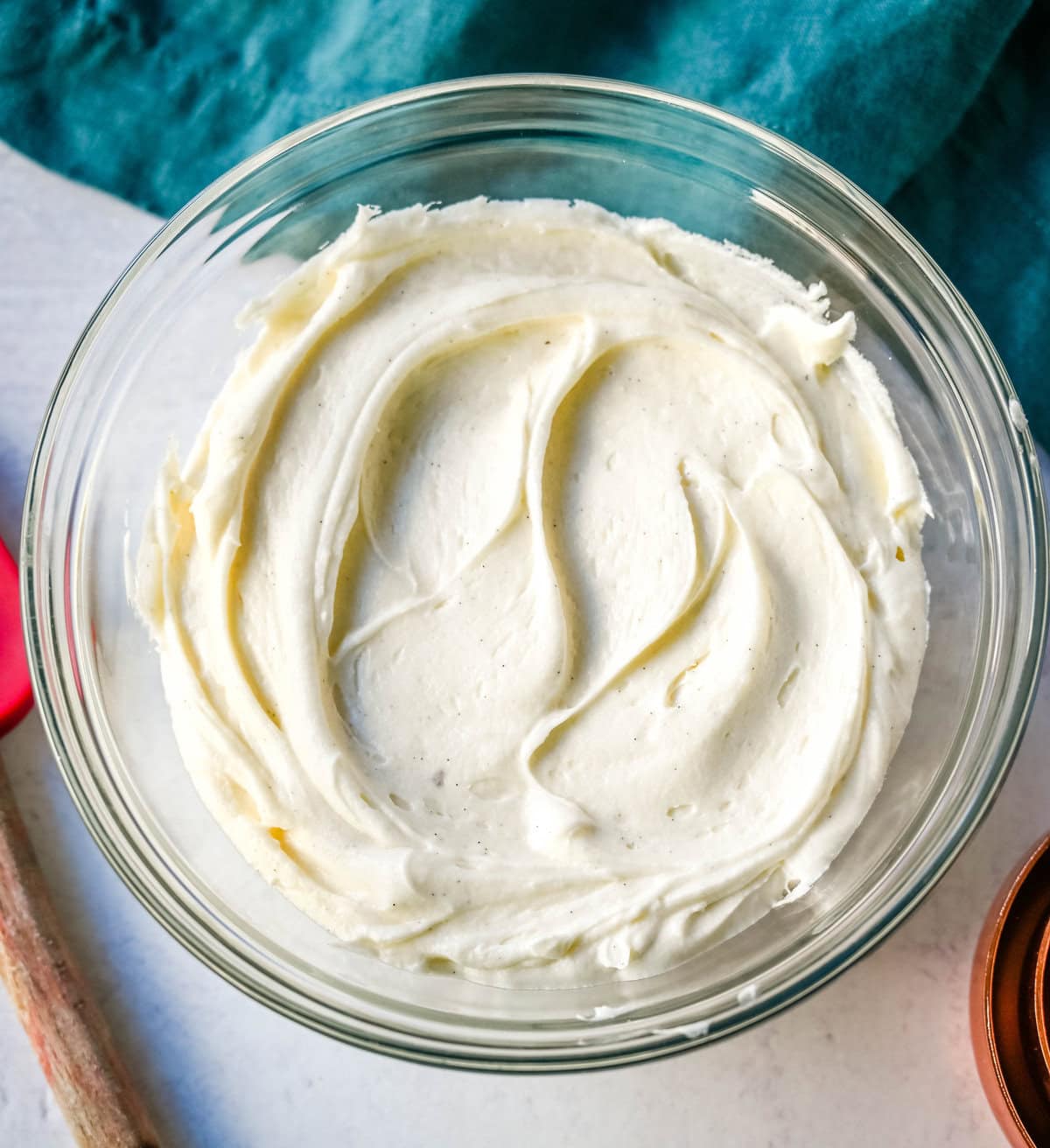 How to make the silkiest, creamiest cream cheese frosting with the perfect amount of sweetness and tang. Sharing the secrets and tips and tricks for making the best cream cheese frosting recipe, which is perfect for adding to so many desserts.