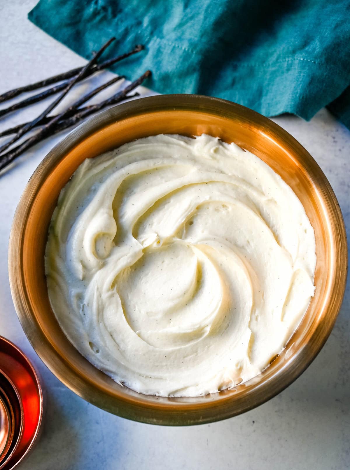 How to make the silkiest, creamiest cream cheese frosting with the perfect amount of sweetness and tang. Sharing the secrets and tips and tricks for making the best cream cheese frosting recipe, which is perfect for adding to so many desserts.