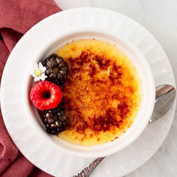 Homemade Creme Brulee Recipe. A creamy, silky vanilla custard topped with crisp sugar crust is one of the most popular desserts at restaurants for good reason. With its silky custard base and crackly caramelized sugar topping, it’s a showstopper that’s surprisingly easy to make at home.