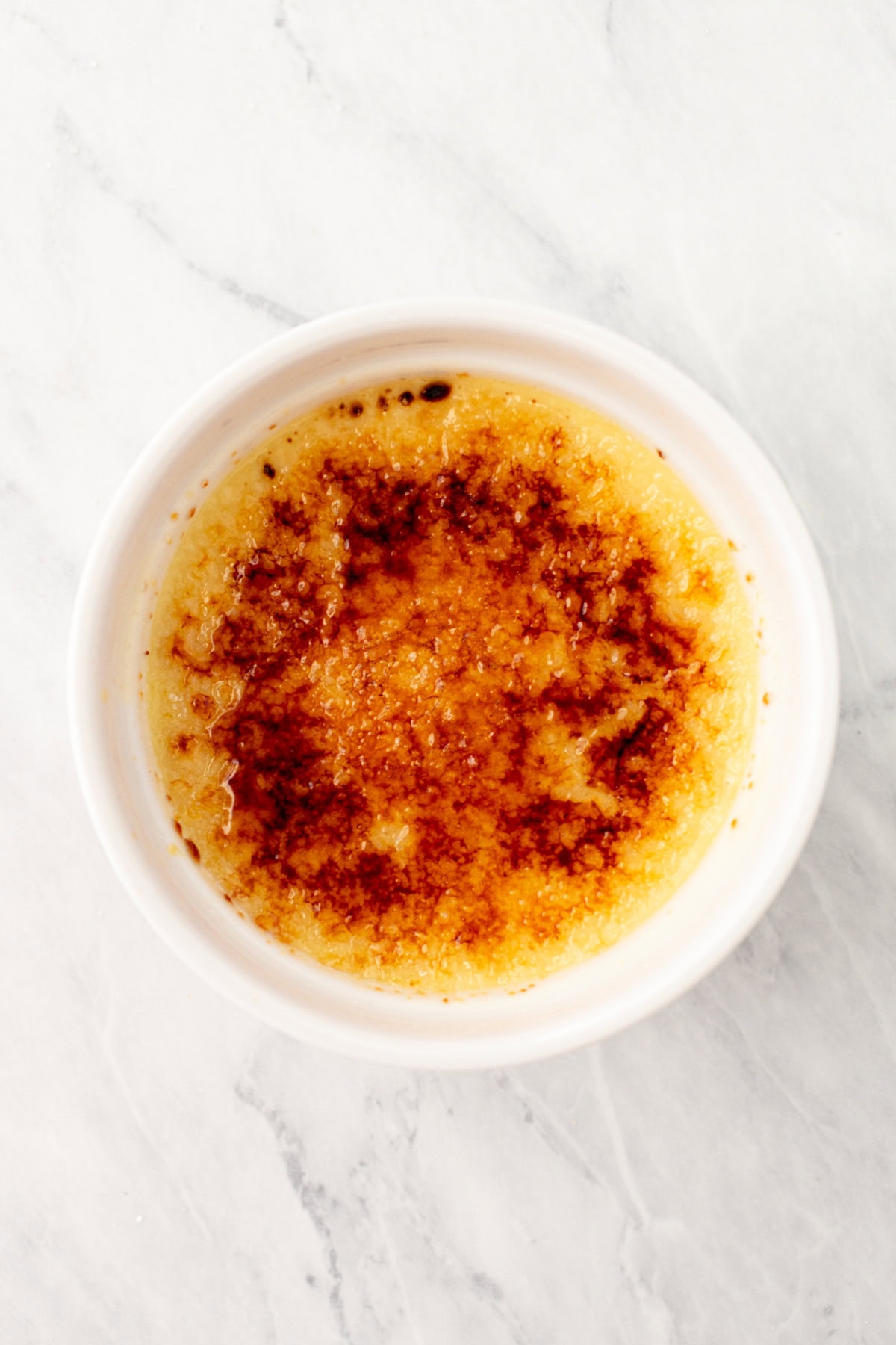 Creme brulee after caramelizing the sugar with a kitchen torch