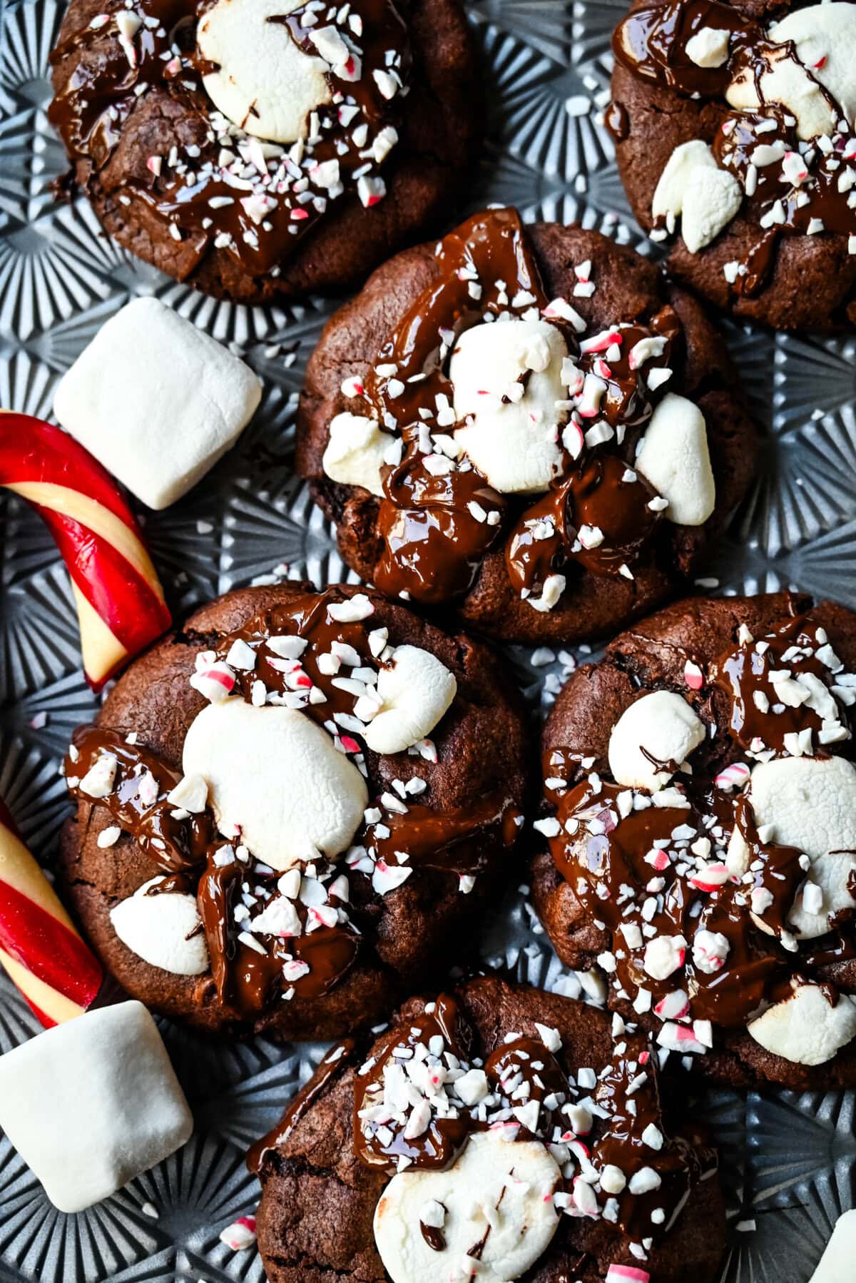 These Hot Cocoa Cookies feature a homemade chocolate cookie base, a gooey marshmallow topping, and a drizzle of melted chocolate for the perfect finishing touch. If you love peppermint, add crushed candy canes and a hint of peppermint extract for Peppermint Hot Cocoa Cookies.