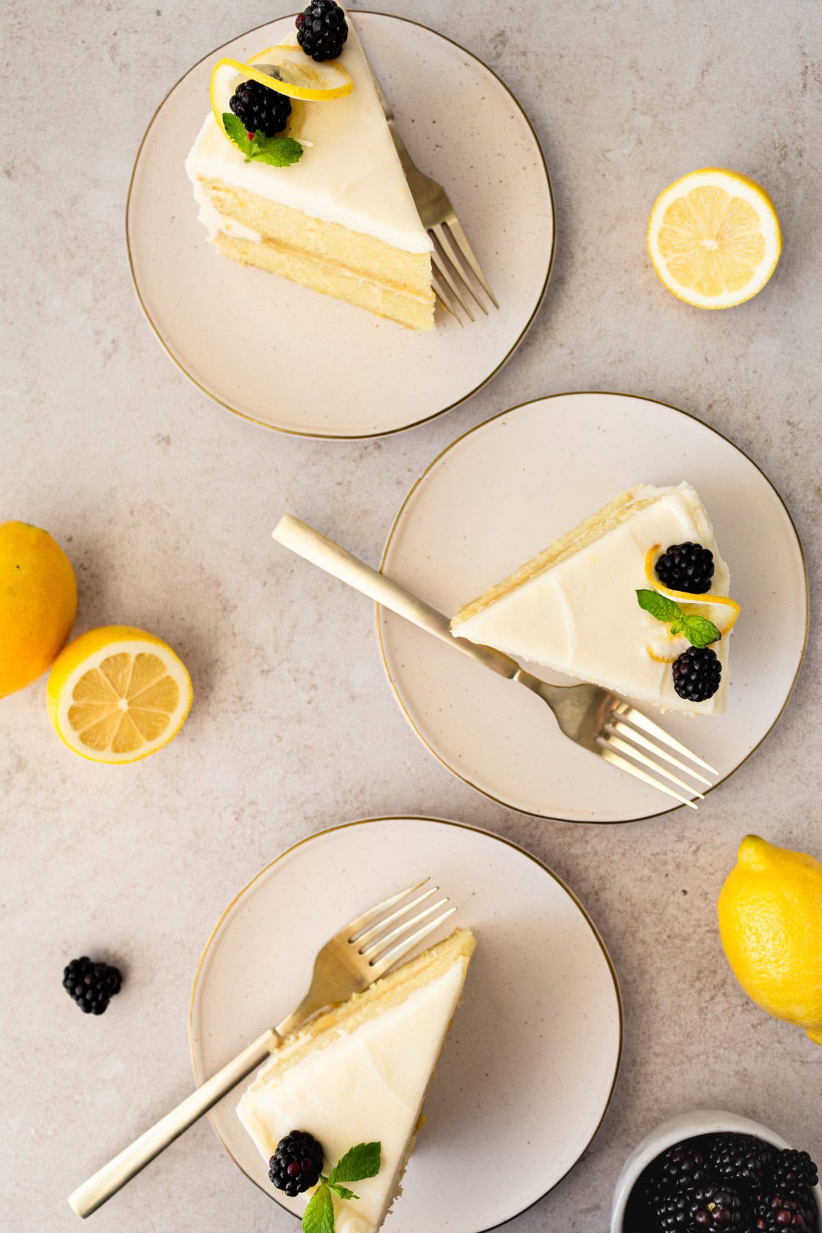 This 5-star rated lemon olive oil cake with cream cheese frosting is one of the most popular cake recipes. It is moist, fluffy, with the perfect amount of lemon flavor. The cream cheese frosting puts it over the top. This is the best lemon olive oil cake recipe!