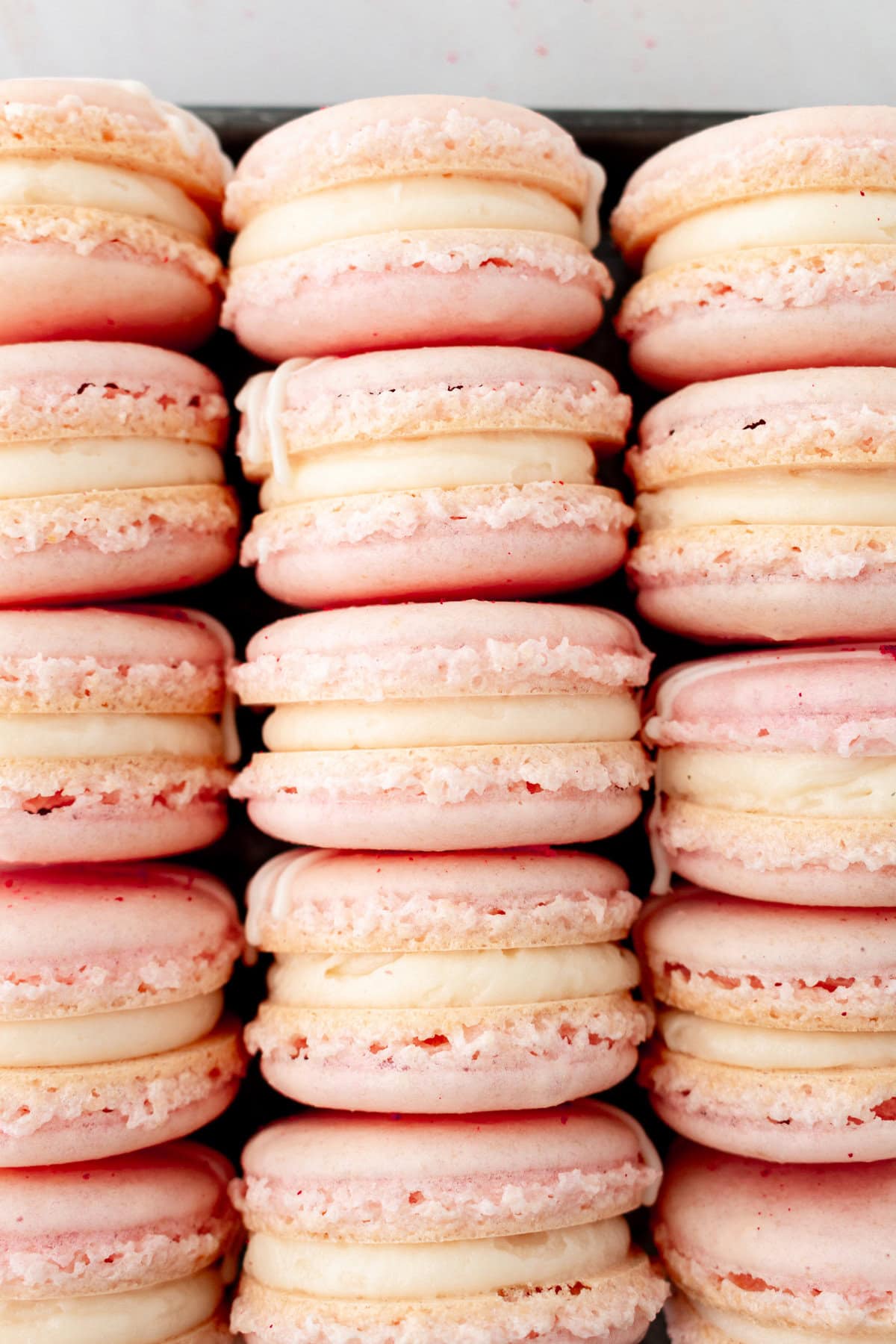 French macarons are delicate sandwich cookies renowned for their crisp shells, airy interiors, and signature “feet” at the base. The best macarons made with whipped egg whites, almond flour, and sugar, they boast a sweet flavor that complements an array of fillings. While they have a reputation for being finicky, mastering these homemade macarons  can be done with these tips and tricks. 