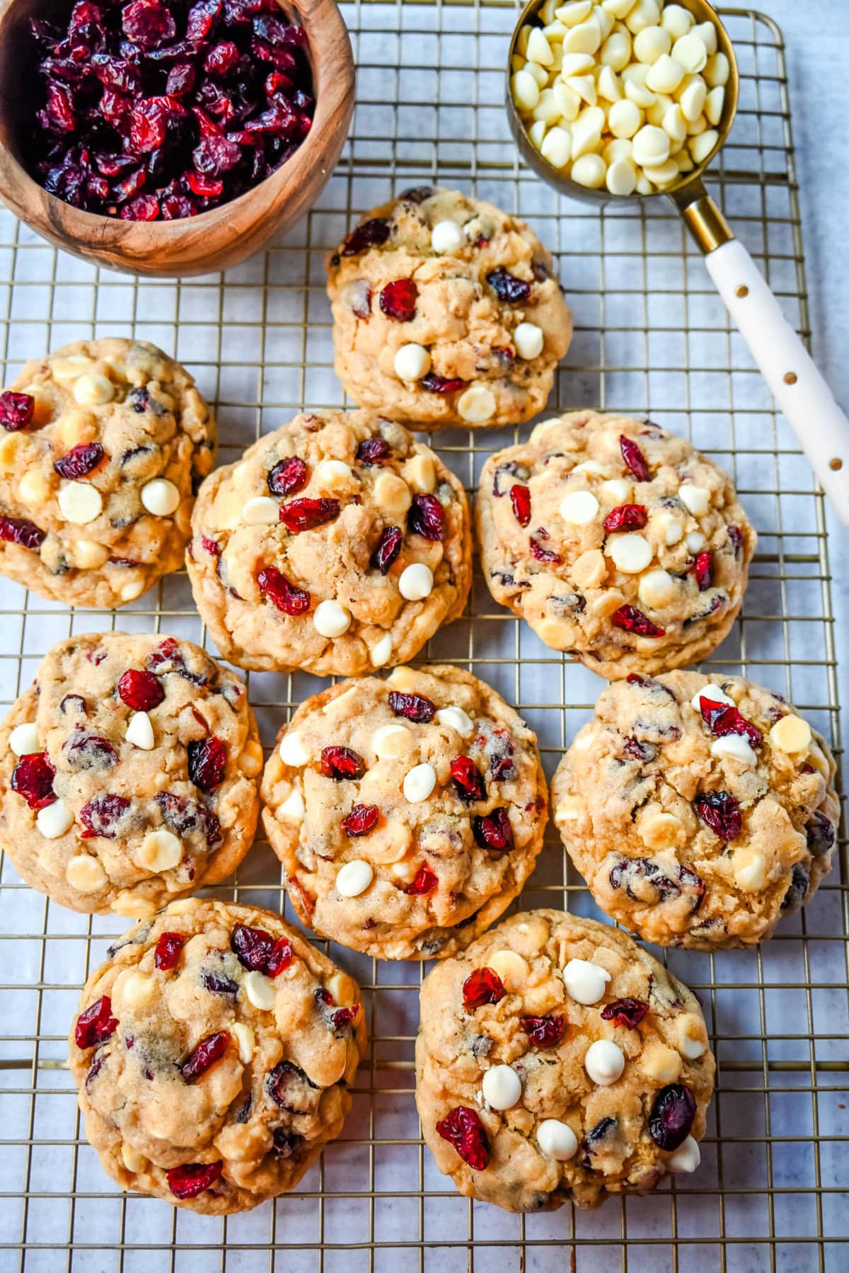 Soft, chewy, hearty oatmeal cranberry white chocolate chip cookies are made with tart dried cranberries, sweet white chocolate chips, and are always 5-star rated. The best Cranberry Oatmeal White Chocolate Chip Cookie recipe!