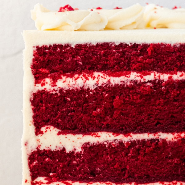 How to make the best red velvet cake with cream cheese frosting. Homemade Red Velvet Cake is soft, tender, and fluffy with the creamiest and most decadent cream cheese frosting. It is no wonder that it is one of the most popular cake recipes and this is the perfect recipe.