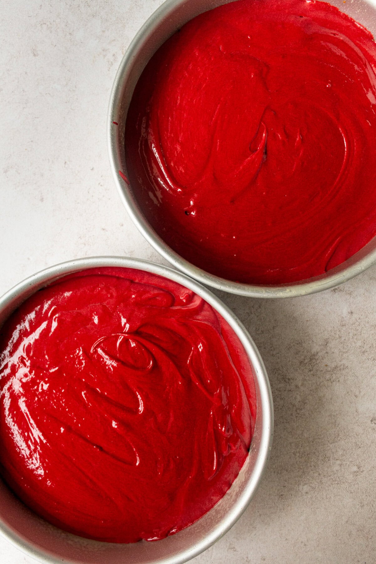 Red Velvet Cake in cake pans before baking