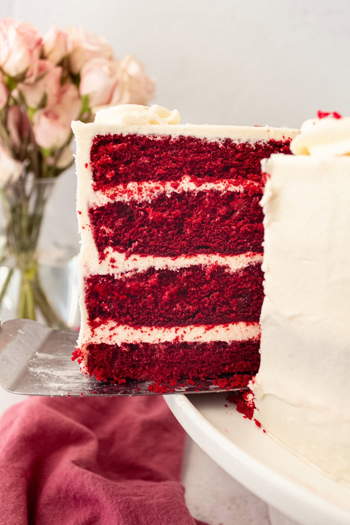 How to make the best red velvet cake with cream cheese frosting. Homemade Red Velvet Cake is soft, tender, and fluffy with the creamiest and most decadent cream cheese frosting. It is no wonder that it is one of the most popular cake recipes and this is the perfect recipe.