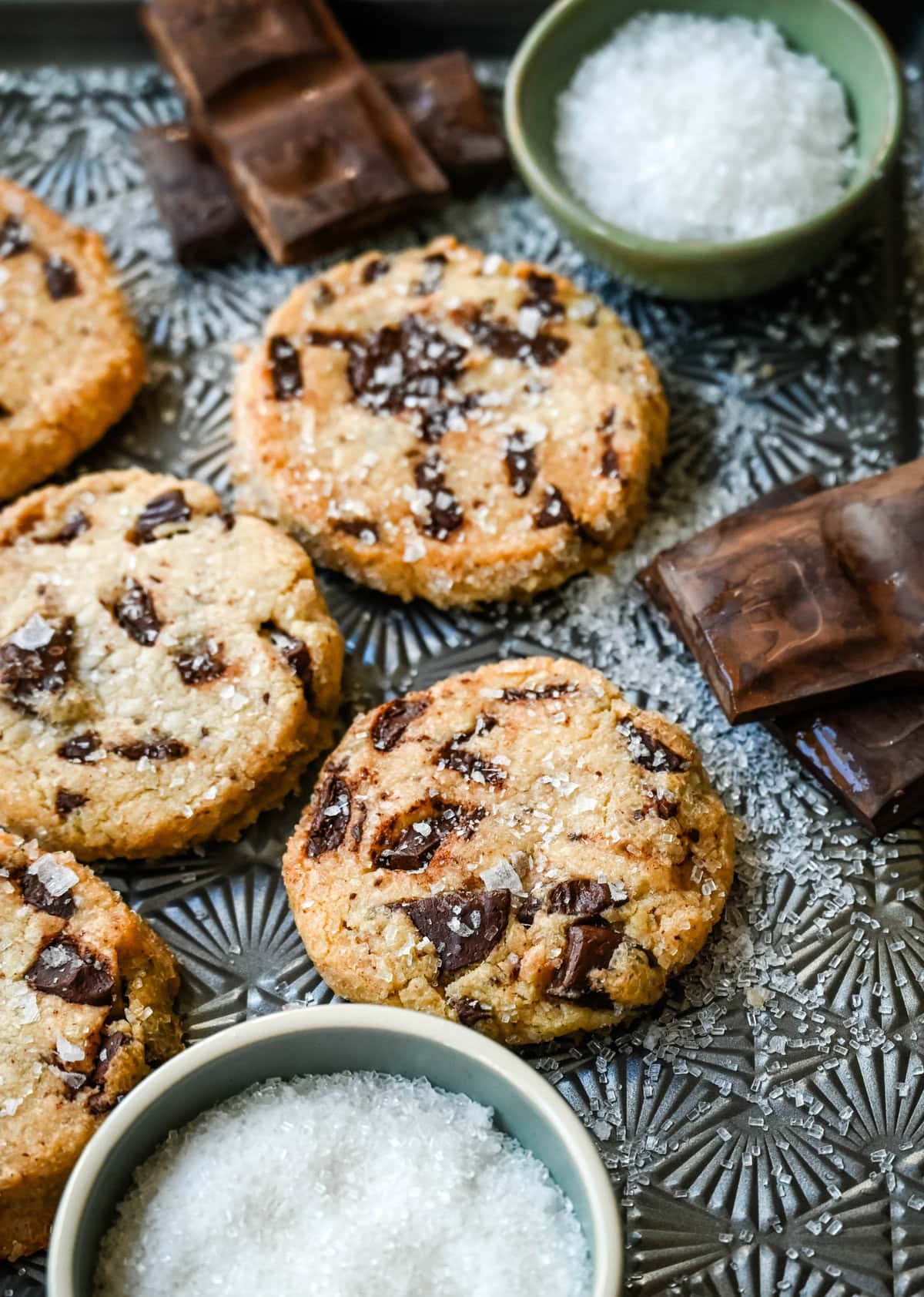 Salted chocolate chunk shortbread cookies are a twist on the classic chocolate chunk cookie, combining buttery, crumbly shortbread with rich chocolate chunks and a hint of flaky sea salt. These chocolate chip shortbread cookies are a perfect balance of sweet, salty, and savory flavors with a melt-in-your-mouth texture.