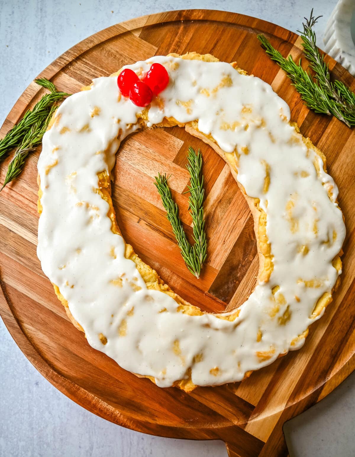 This homemade Swedish Pastry, also known as Danish Kringle, features a buttery crust, an almond filling, and topped with an almond frosting. This buttery pastry is buttery, creamy, and has just the right sweetness. A holiday tradition! Danish Kringle wreath