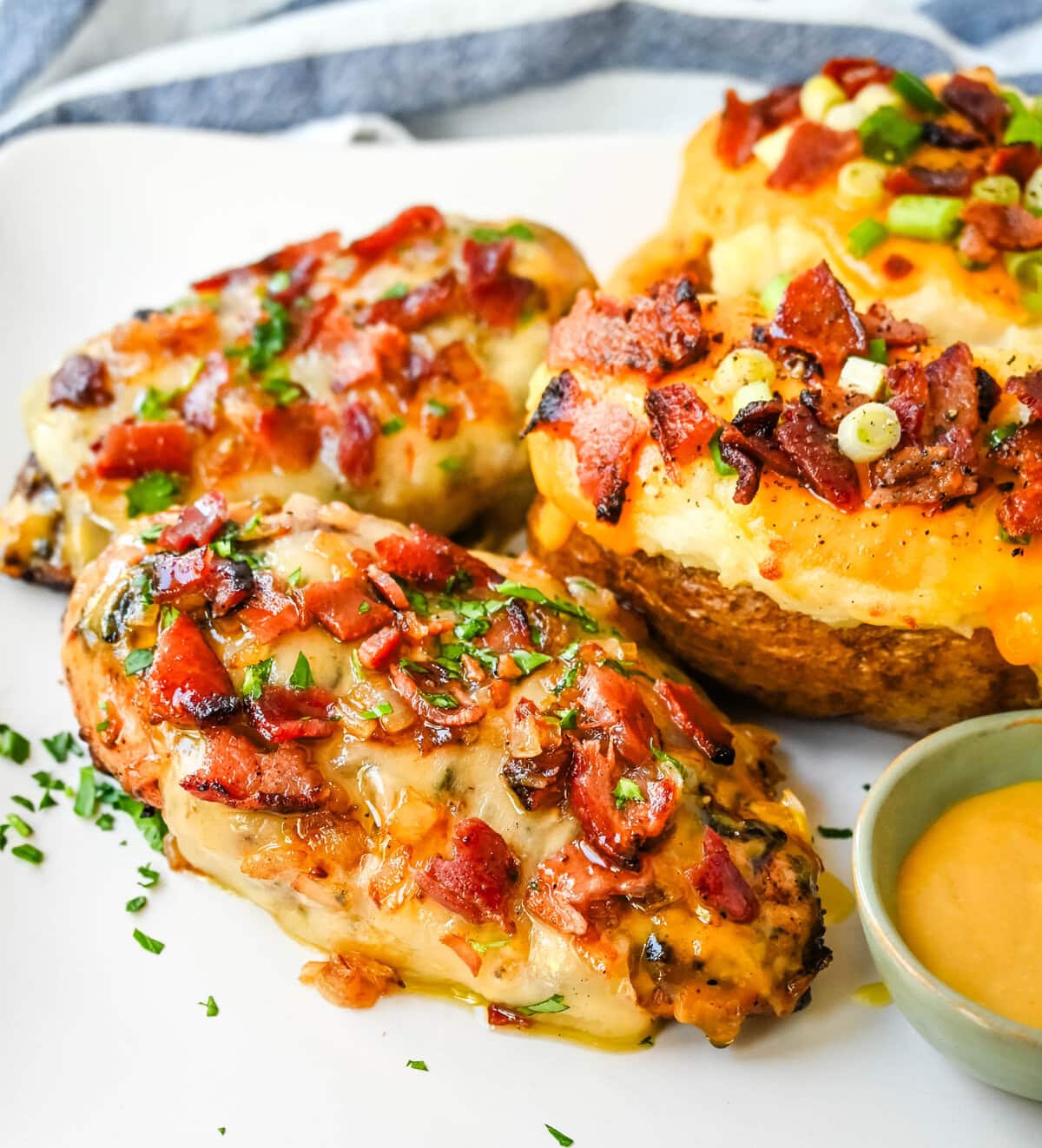 Cheesy Bacon Smothered Chicken. This juicy, marinated grilled chicken breast is smothered with honey mustard sauce, melted cheese, and crispy bacon. To make it extra flavorful, add caramelized onions or mushrooms. You may know this as the famous Alice Springs Chicken from Outback Steakhouse but you can make it at home. 