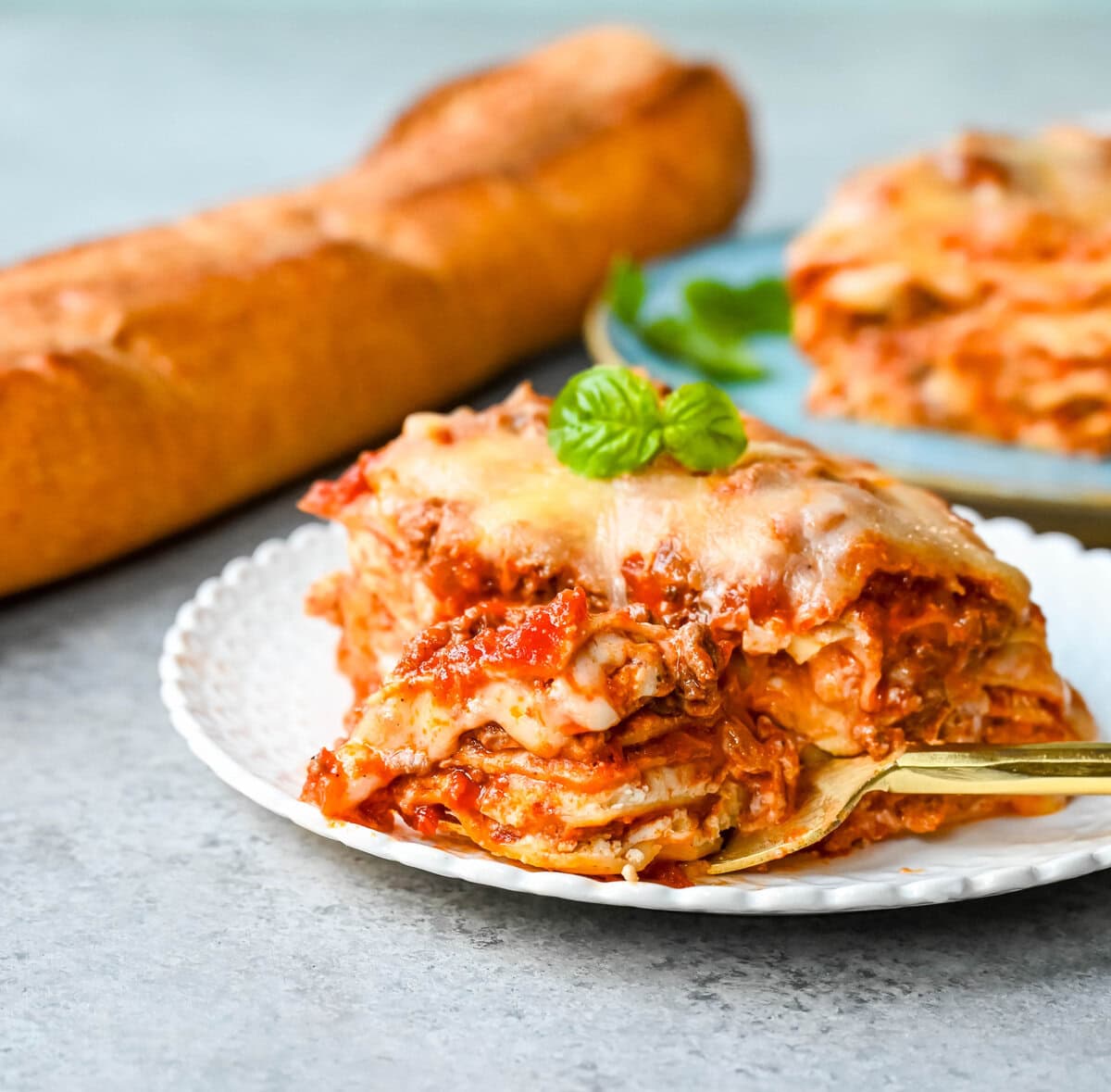 Classic Lasagna Recipe. The perfect lasagna recipe made with parmesan ricotta cheese filling, melted mozzarella cheese, lasagna noodles, and a robust tomato meat sauce. It is the best lasagna recipe!