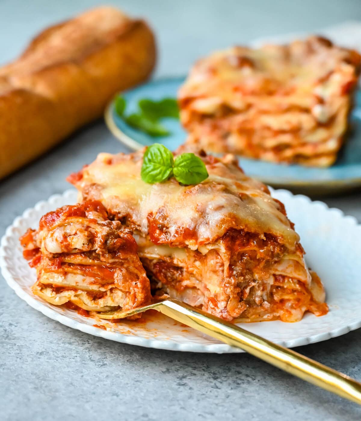 Classic Lasagna Recipe. The perfect lasagna recipe made with parmesan ricotta cheese filling, melted mozzarella cheese, lasagna noodles, and a robust tomato meat sauce. It is the best lasagna recipe!