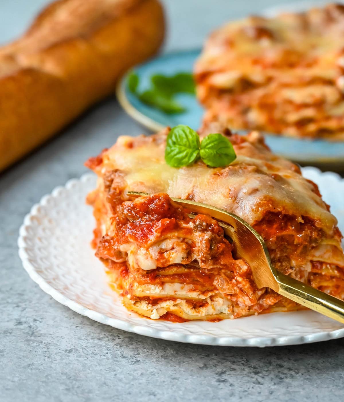 Classic Lasagna Recipe. The perfect lasagna recipe made with parmesan ricotta cheese filling, melted mozzarella cheese, lasagna noodles, and a robust tomato meat sauce. It is the best lasagna recipe!

