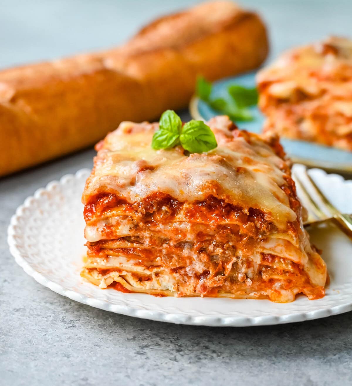 Classic Lasagna Recipe. The perfect lasagna recipe made with parmesan ricotta cheese filling, melted mozzarella cheese, lasagna noodles, and a robust tomato meat sauce. It is the best lasagna recipe!