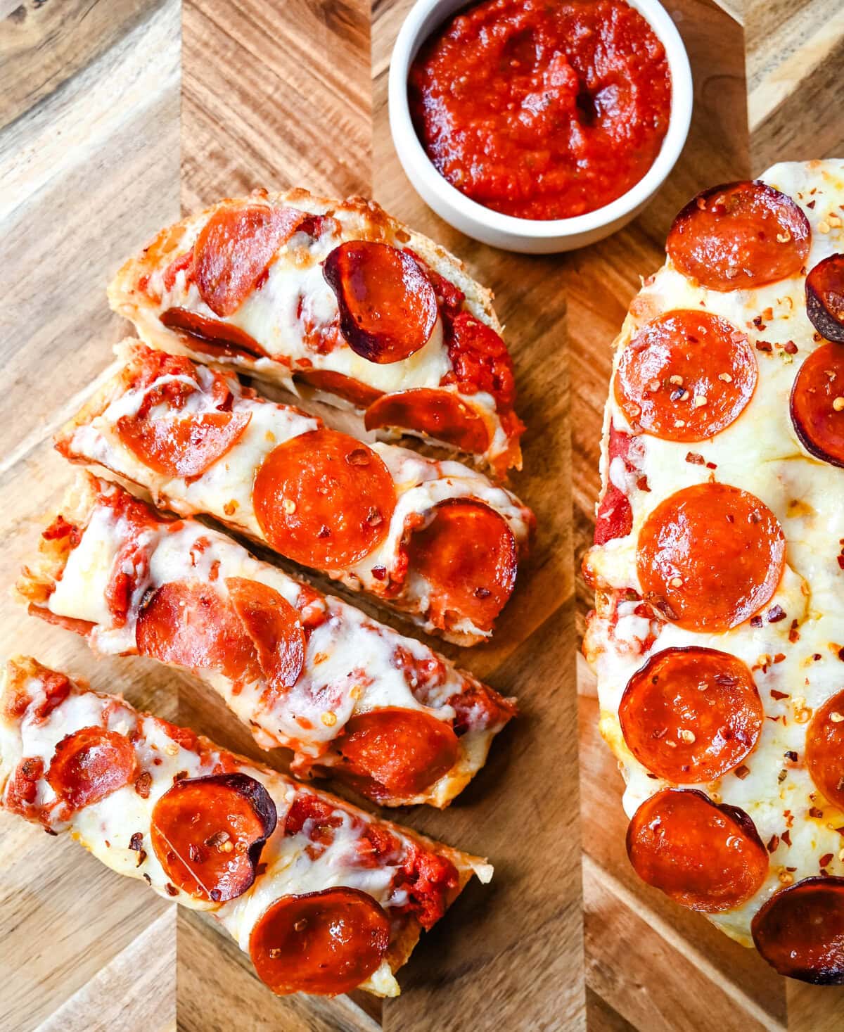 Homemade French Bread Pizzas. If you love the flavor of homemade pizza but want something simple, fast, and incredibly tasty, French bread pizzas are the perfect fix. This Garlic Butter French Bread Pizza starts with garlic butter brushed on the bread and topped with pizza sauce, mozzarella cheese, and pepperoni.