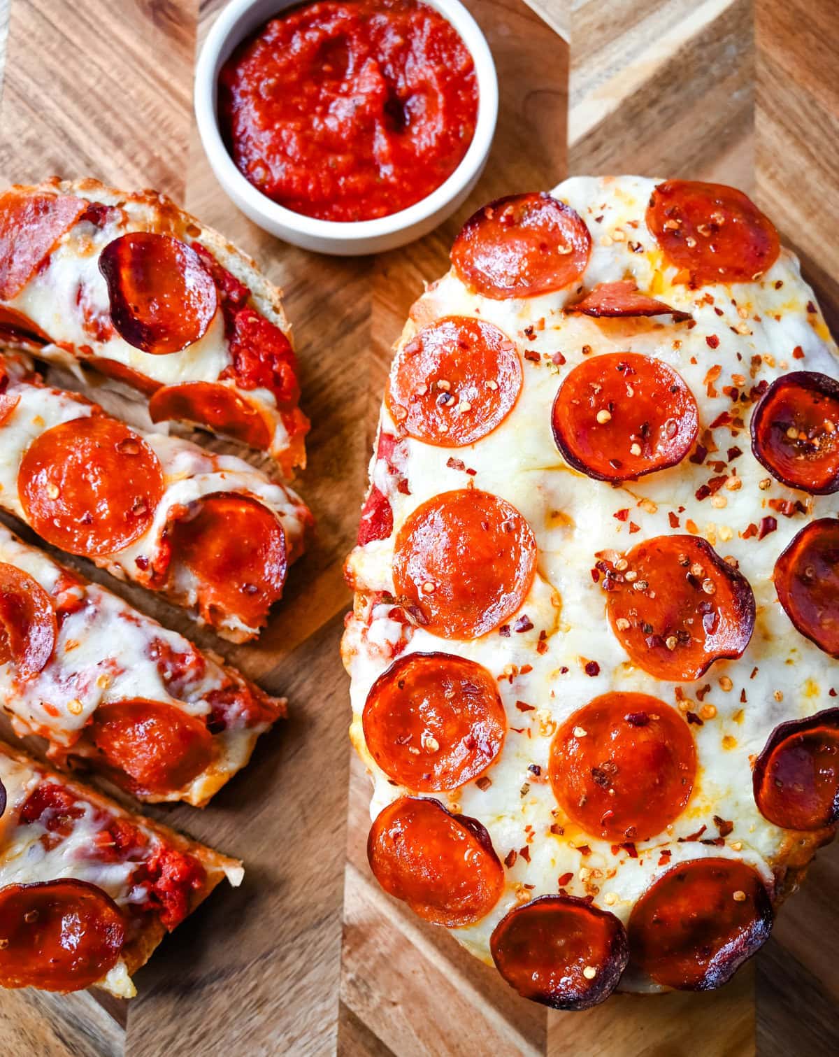 Homemade French Bread Pizzas. If you love the flavor of homemade pizza but want something simple, fast, and incredibly tasty, French bread pizzas are the perfect fix. This Garlic Butter French Bread Pizza starts with garlic butter brushed on the bread and topped with pizza sauce, mozzarella cheese, and pepperoni.