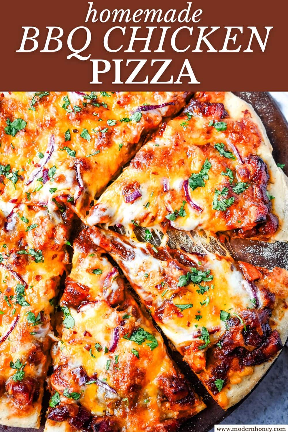 This Homemade BBQ Chicken Pizza is made with a Homemade Pizza Crust, BBQ Ranch Sauce, Mozzarella and Cheddar Cheeses, Red Onion, and a touch of Cilantro.  THE BEST BBQ CHICKEN PIZZA RECIPE.