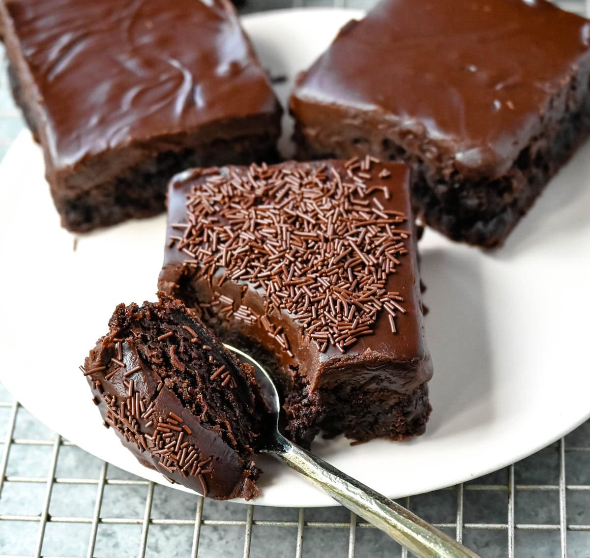 These Lunch Lady Frosted Brownies are rich, fudgy brownies topped with a silky, velvety chocolate frosting. These Frosted Brownies are the best chocolate dessert bar recipe. If you love chocolate, you will love these Brownies with Chocolate Frosting.