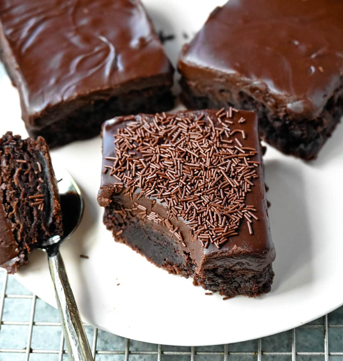 These Lunch Lady Frosted Brownies are rich, fudgy brownies topped with a silky, velvety chocolate frosting. These Frosted Brownies are the best chocolate dessert bar recipe. If you love chocolate, you will love these Brownies with Chocolate Frosting.