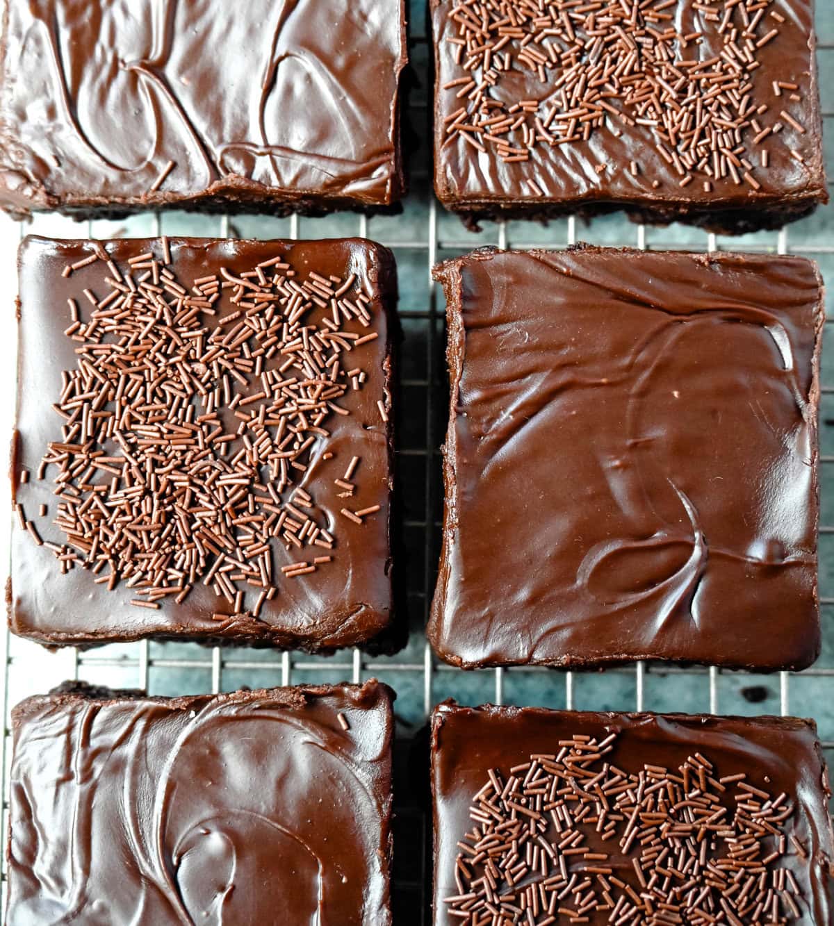 These Lunch Lady Frosted Brownies are rich, fudgy brownies topped with a silky, velvety chocolate frosting. These Frosted Brownies are the best chocolate dessert bar recipe. If you love chocolate, you will love these Brownies with Chocolate Frosting.