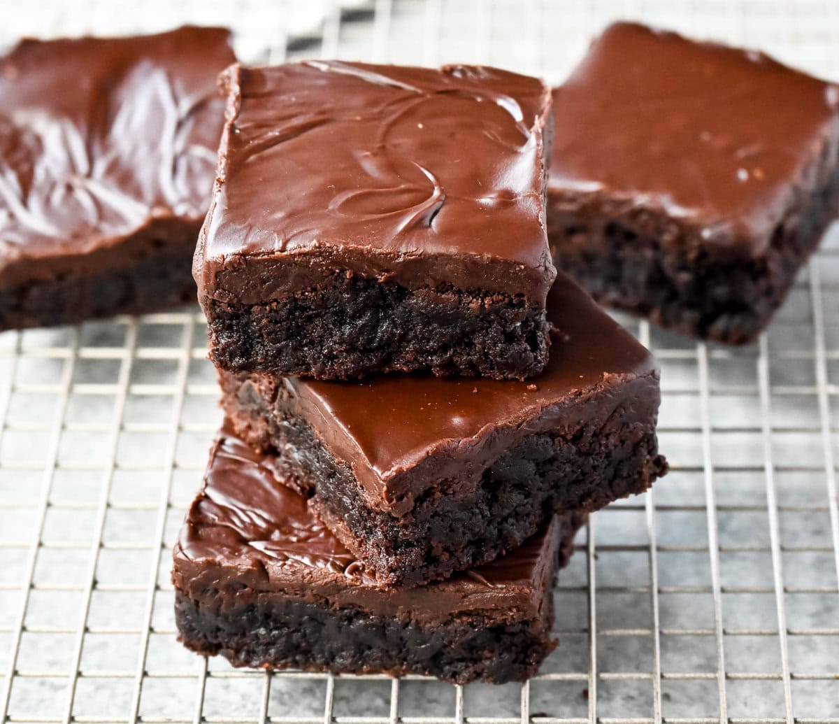 These Lunch Lady Frosted Brownies are rich, fudgy brownies topped with a silky, velvety chocolate frosting. These Frosted Brownies are the best chocolate dessert bar recipe. If you love chocolate, you will love these Brownies with Chocolate Frosting.