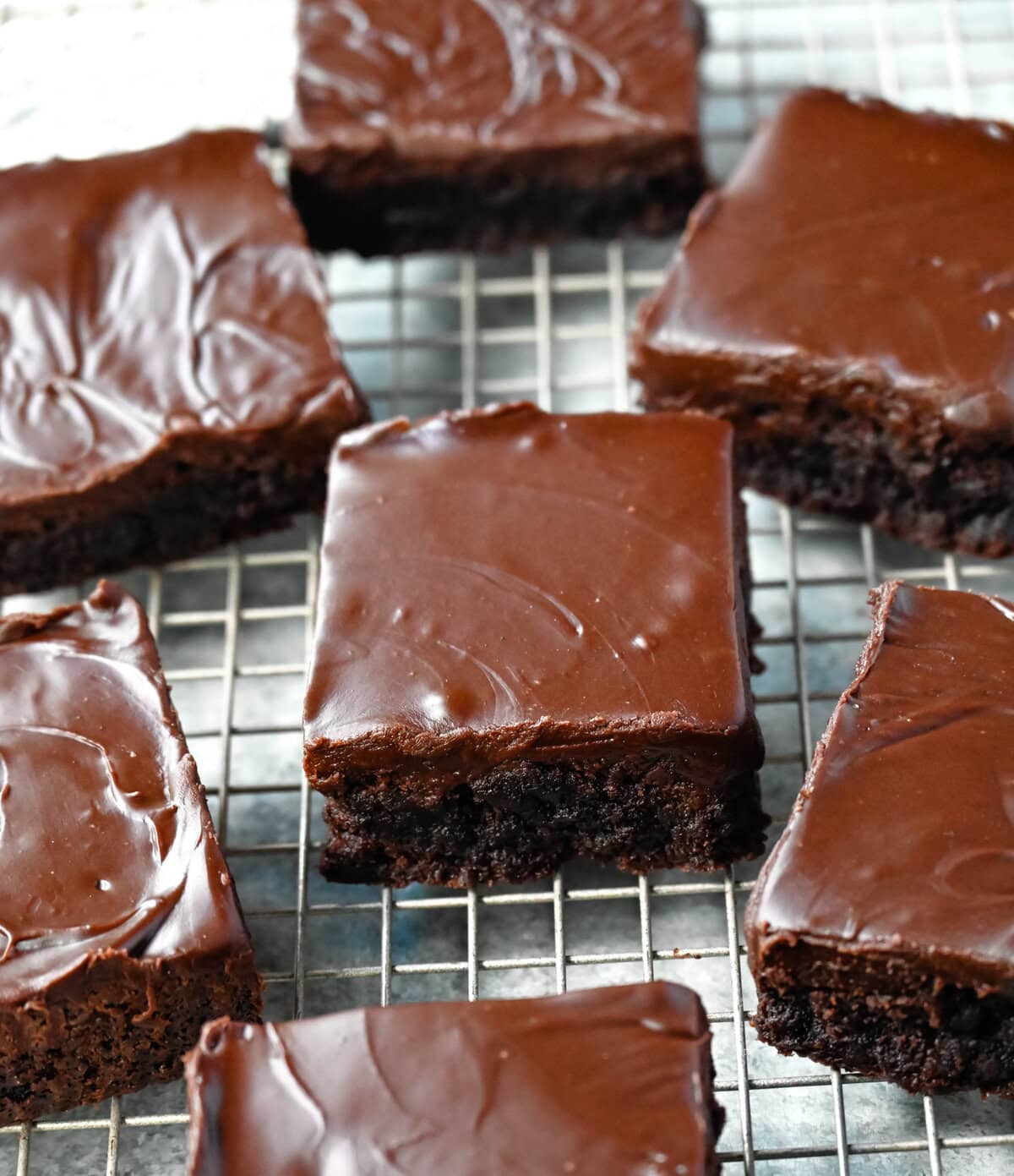 These Lunch Lady Frosted Brownies are rich, fudgy brownies topped with a silky, velvety chocolate frosting. These Frosted Brownies are the best chocolate dessert bar recipe. If you love chocolate, you will love these Brownies with Chocolate Frosting.