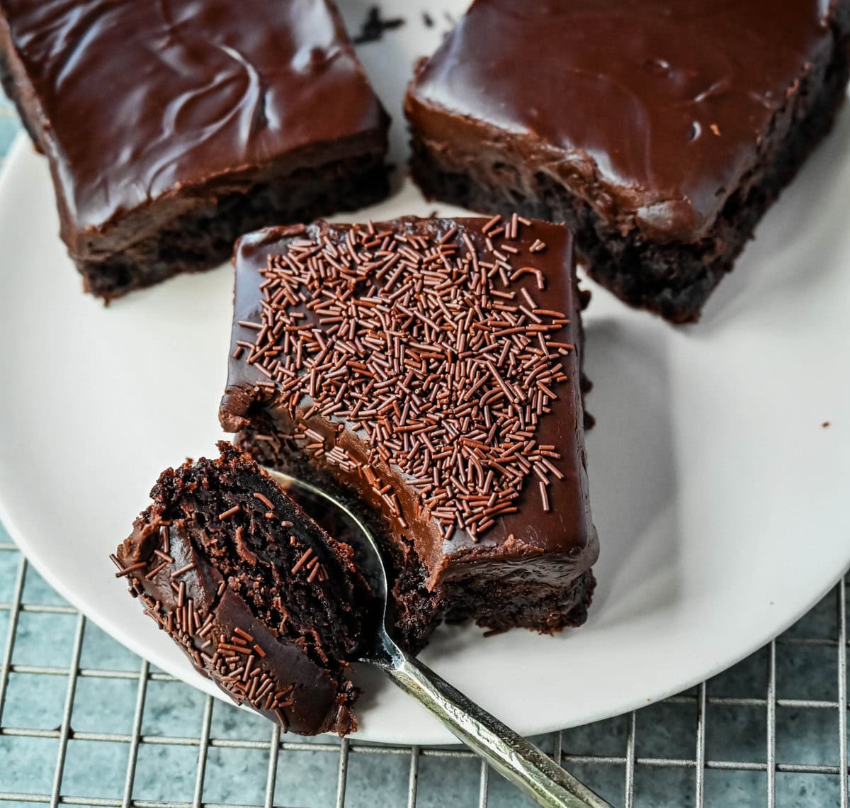 These Lunch Lady Frosted Brownies are rich, fudgy brownies topped with a silky, velvety chocolate frosting. These Frosted Brownies are the best chocolate dessert bar recipe. If you love chocolate, you will love these Brownies with Chocolate Frosting.