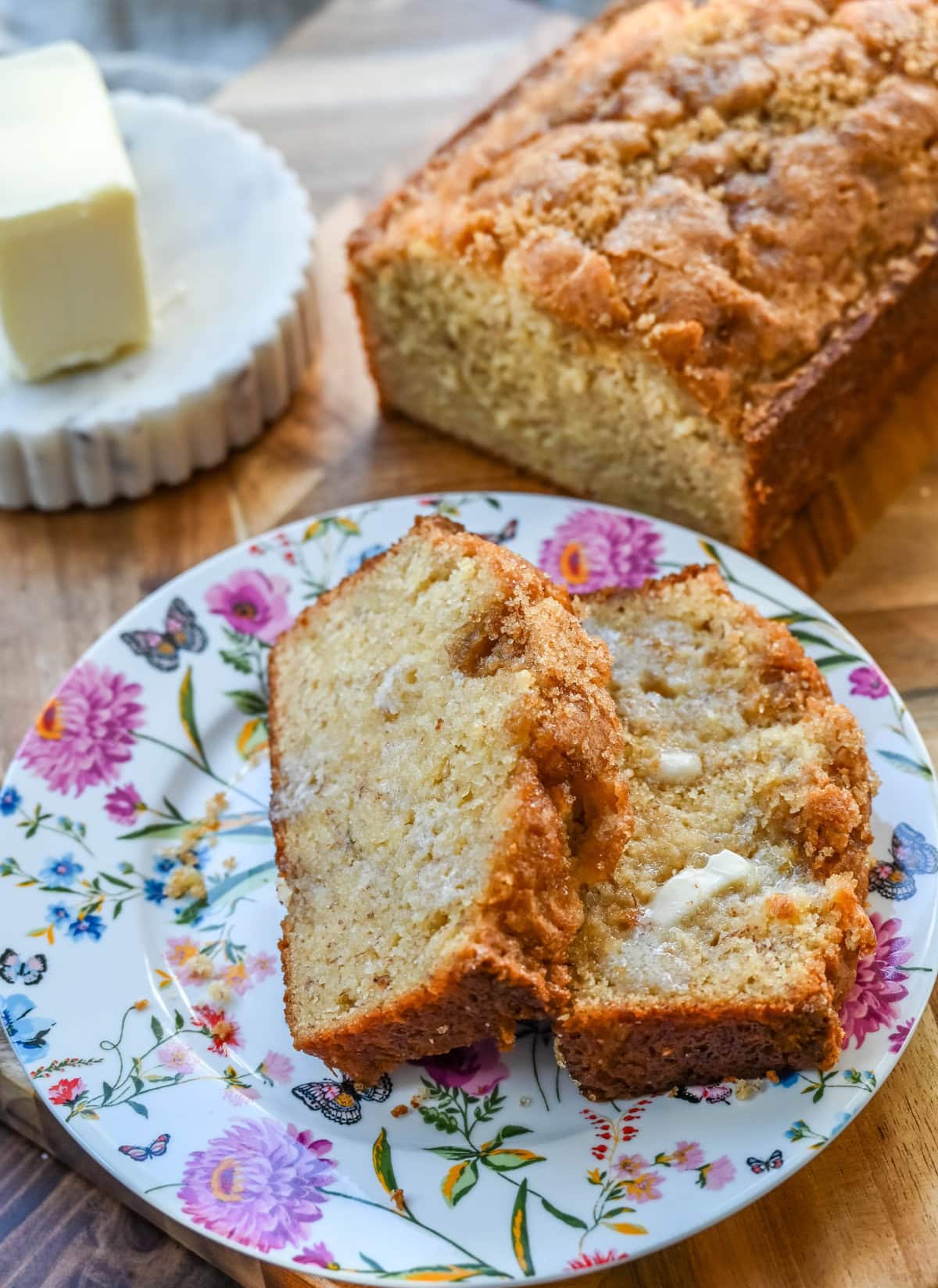 If you are looking for a moist, tender, flavorful, melt-in-your-mouth banana bread, this is the best banana bread recipe! It is made with both butter and oil, sour cream and buttermilk, and ripe, sweet bananas for baking up the most perfect banana bread.